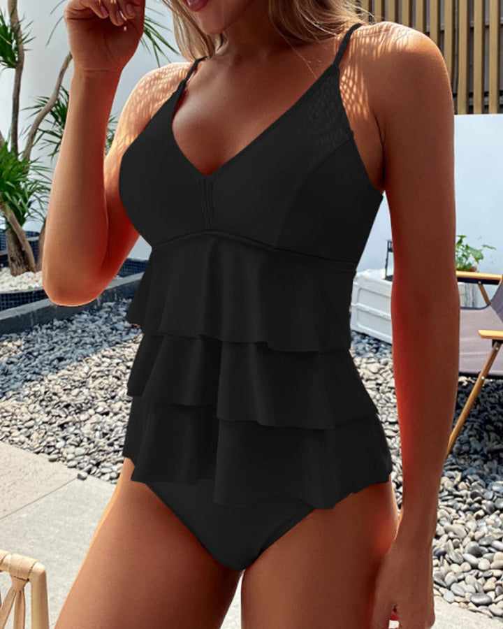 Lia | Elegante Costume con Raffinate Balze